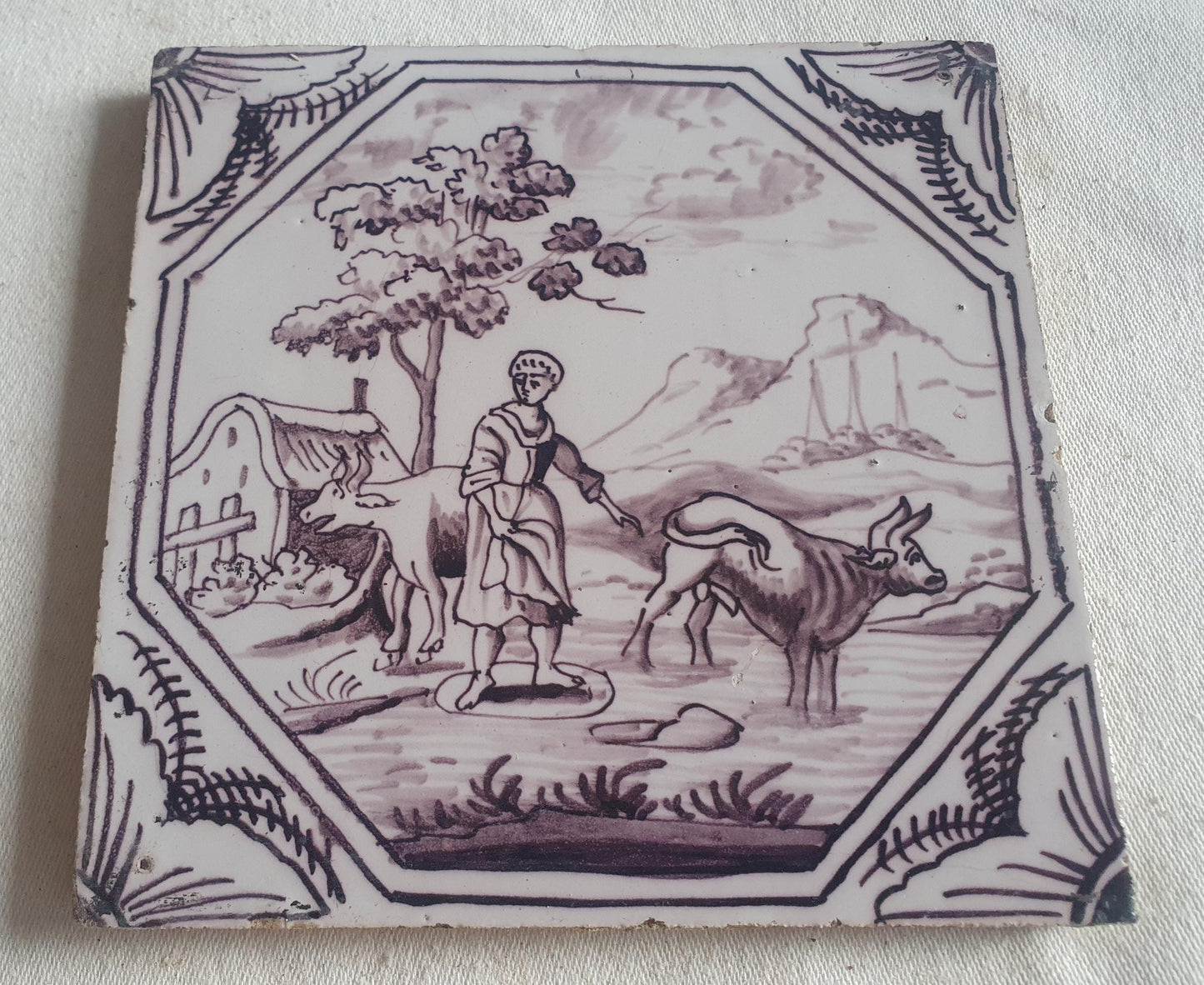Delft tile, woman with two cows 18th century (c. 1760) Dutchmanganese tile . ( Animal tile )