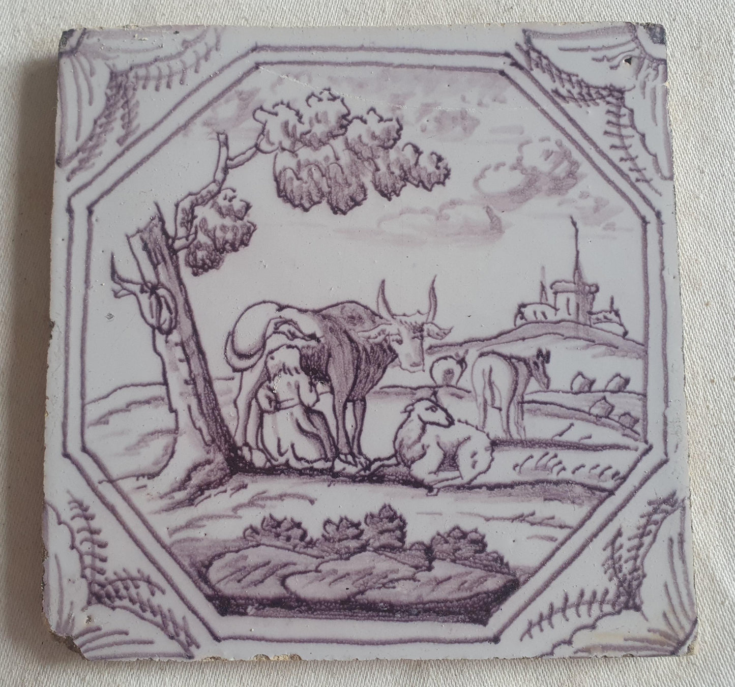Delft tile, woman milking a cow ,18th century (c. 1760) Dutchmanganese tile . ( Animal tile )