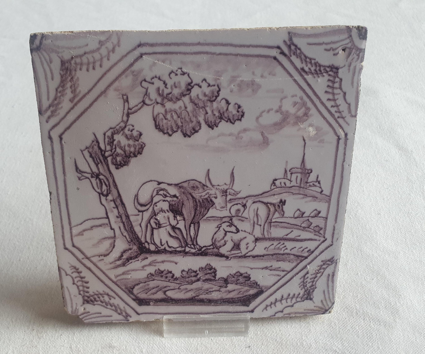 Delft tile, woman milking a cow ,18th century (c. 1760) Dutchmanganese tile . ( Animal tile )