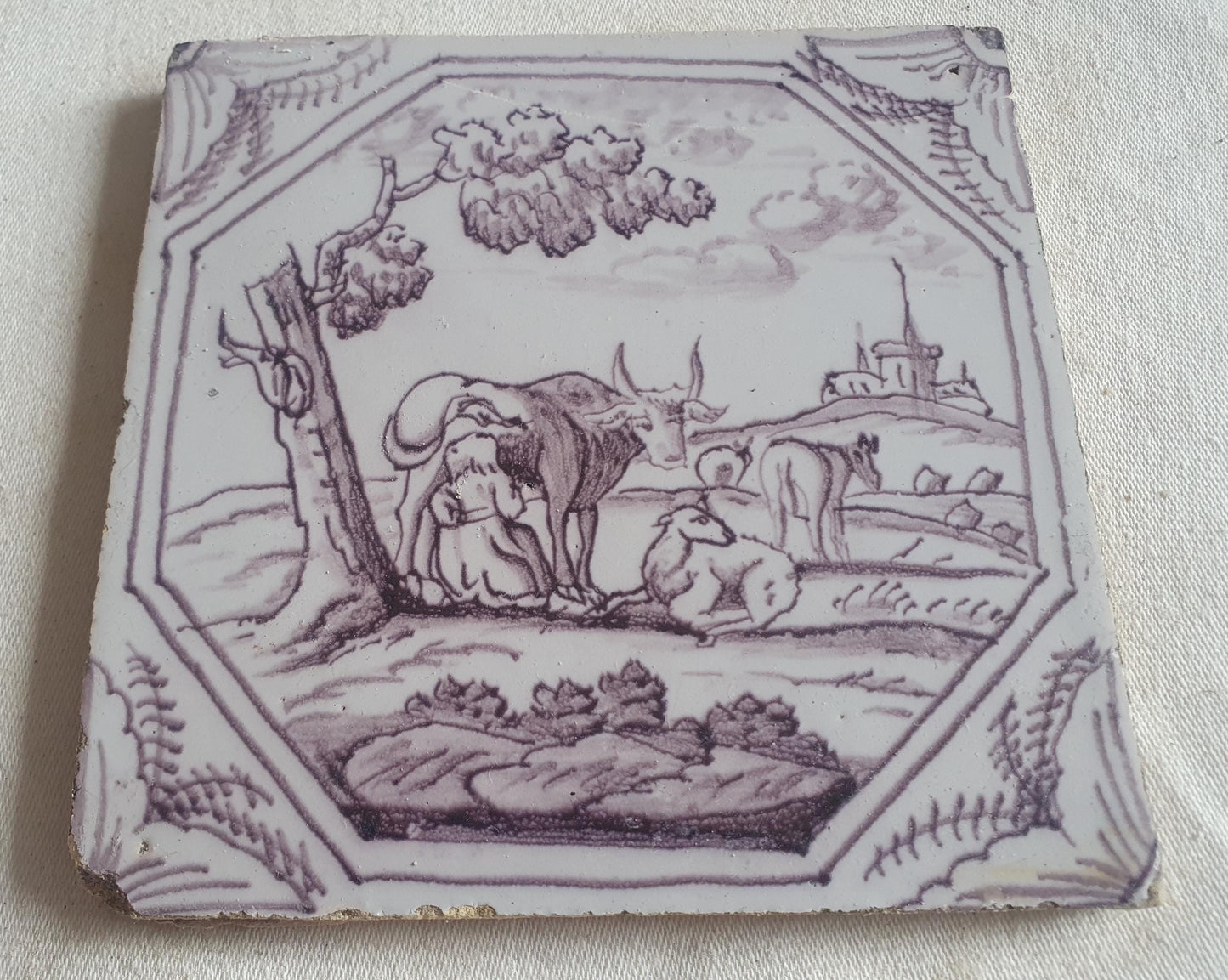 Delft tile, woman milking a cow ,18th century (c. 1760) Dutchmanganese tile . ( Animal tile )