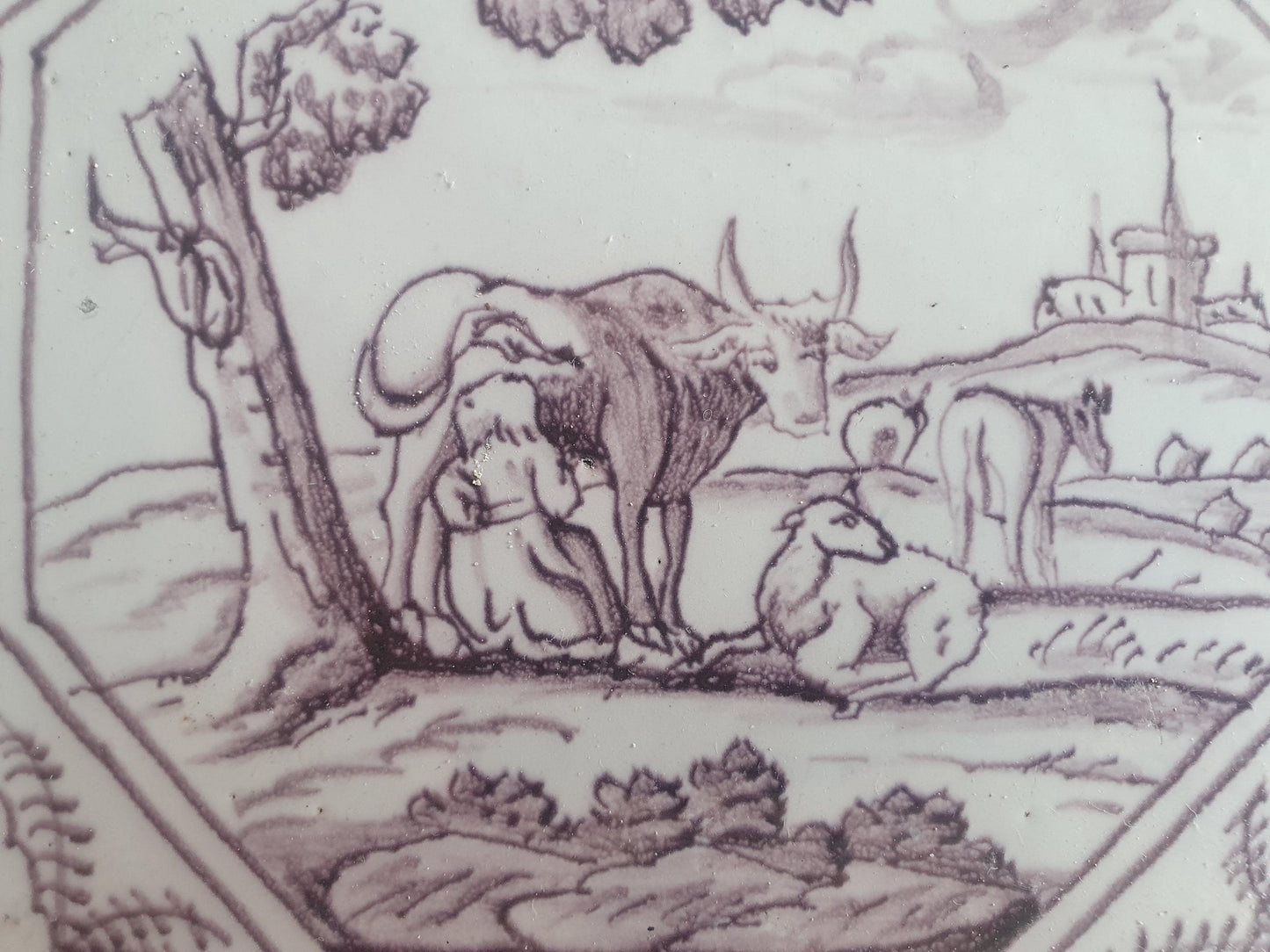 Delft tile, woman milking a cow ,18th century (c. 1760) Dutchmanganese tile . ( Animal tile )