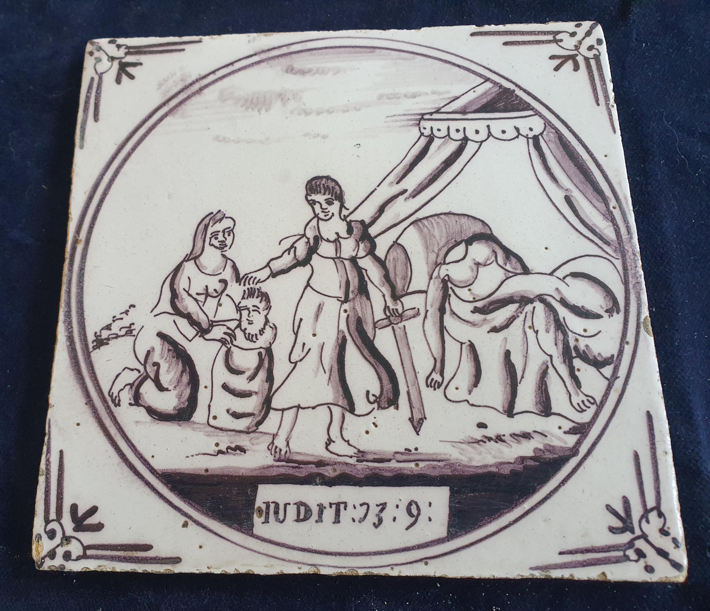 Delft tile, Dutch manganese biblical scene bible tile, 18th century , The beheading of the Assyrian army commander.