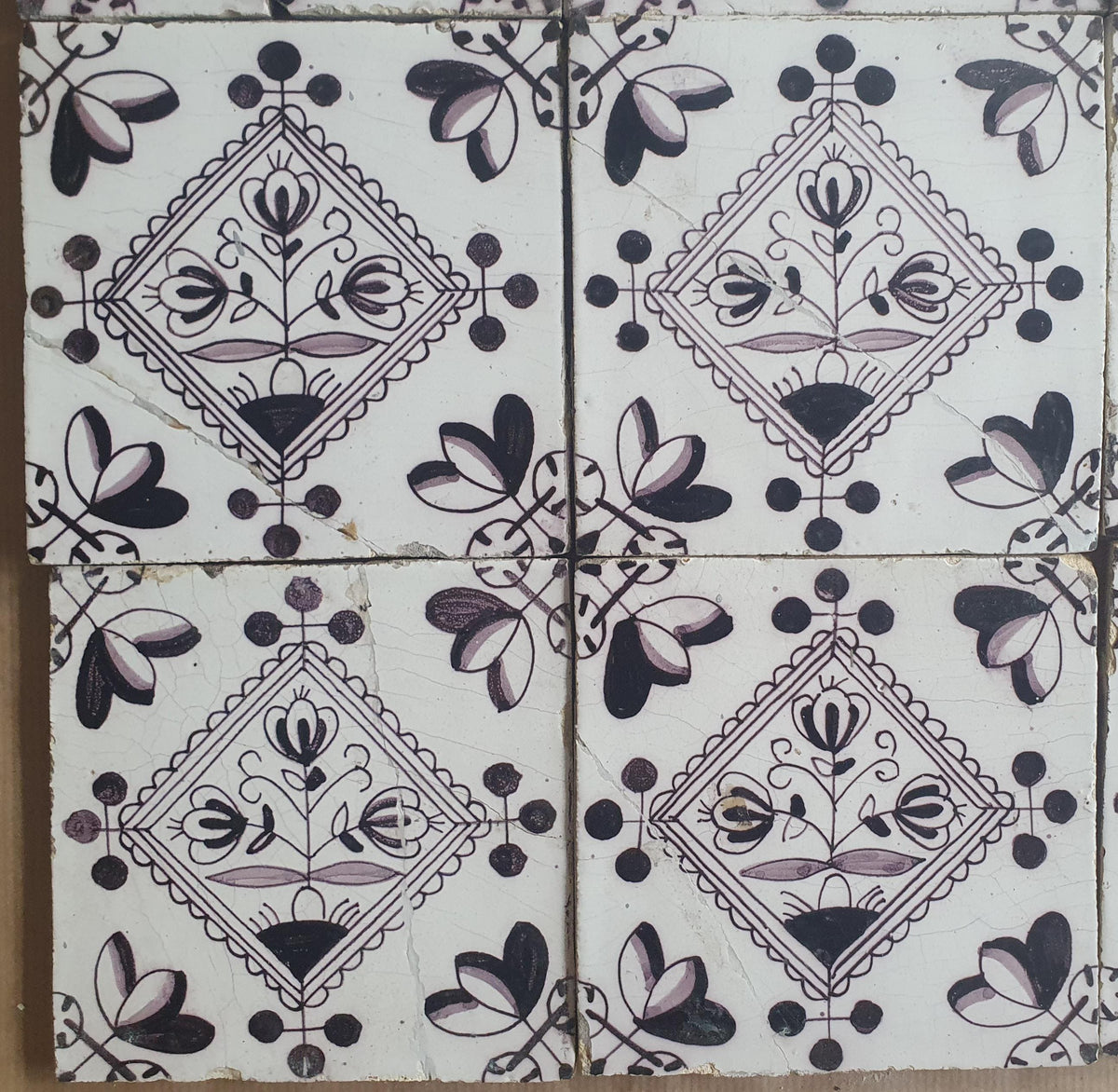 Set of 9 antique Dutch wall tiles, circular tiles featuring flower vases in manganese; Delft Blue Dutch backsplash fireplace tiles.