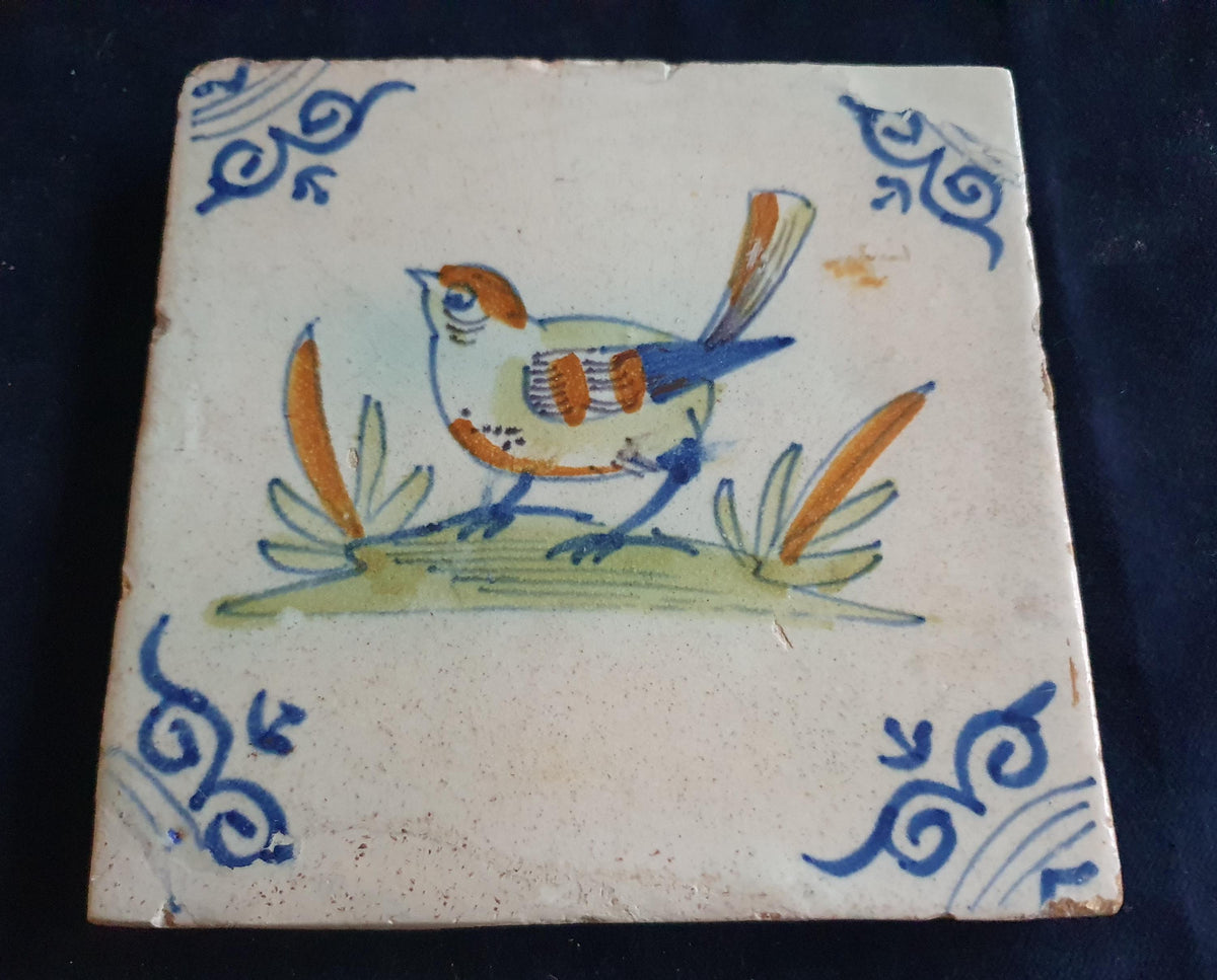 Antique Delft Tile - Polychrome  Bird with oxhead corner Motifs, Around 1640 animaltile