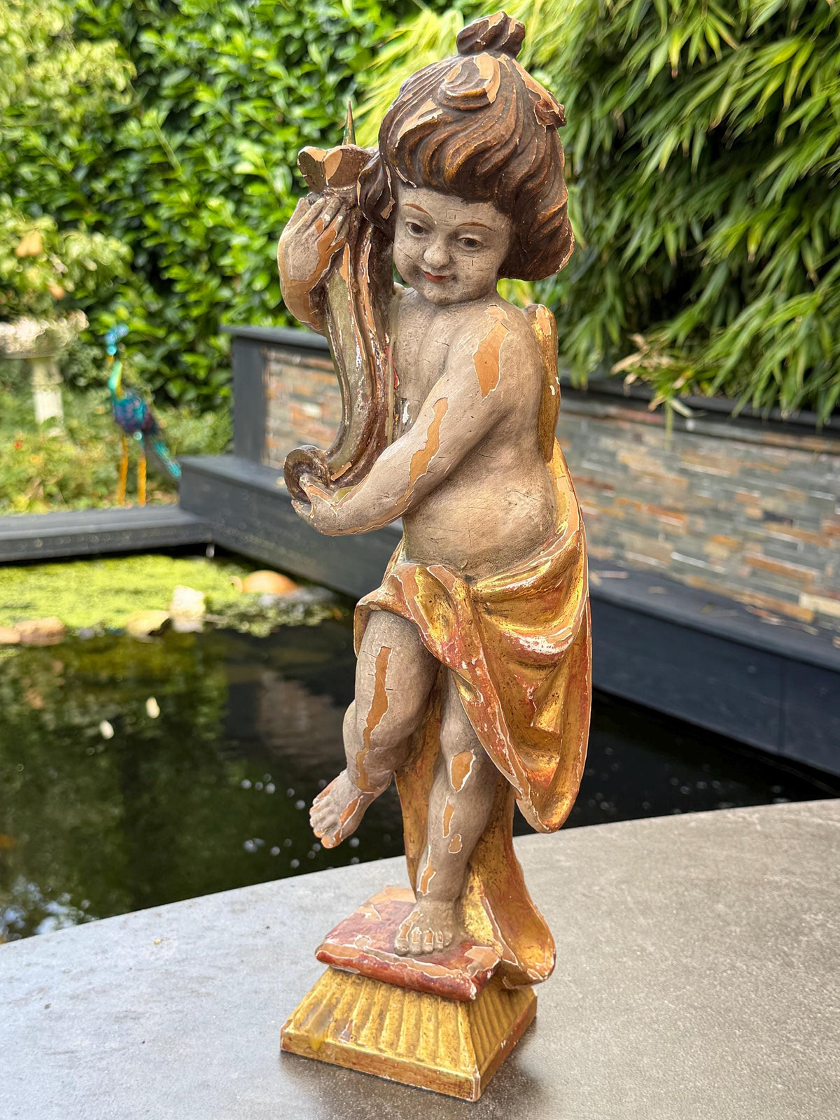 18th Century South German Baroque Polychrome and Giltwood Putto Candle Holder with Iron Candle Spike
