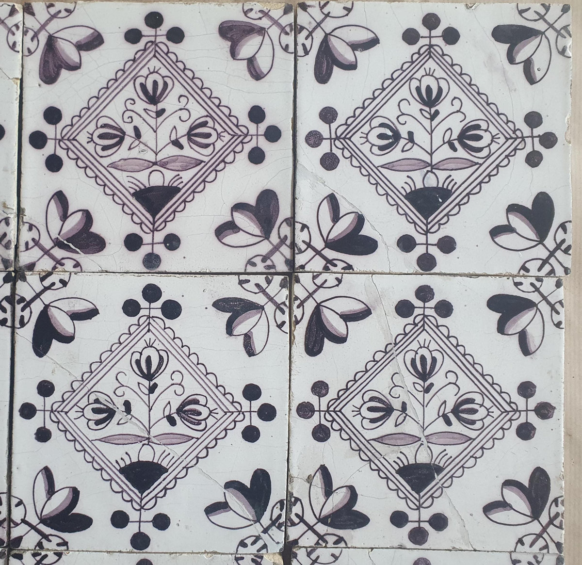 Set of 9 antique Dutch wall tiles, circular tiles featuring flower vases in manganese; Delft Blue Dutch backsplash fireplace tiles.