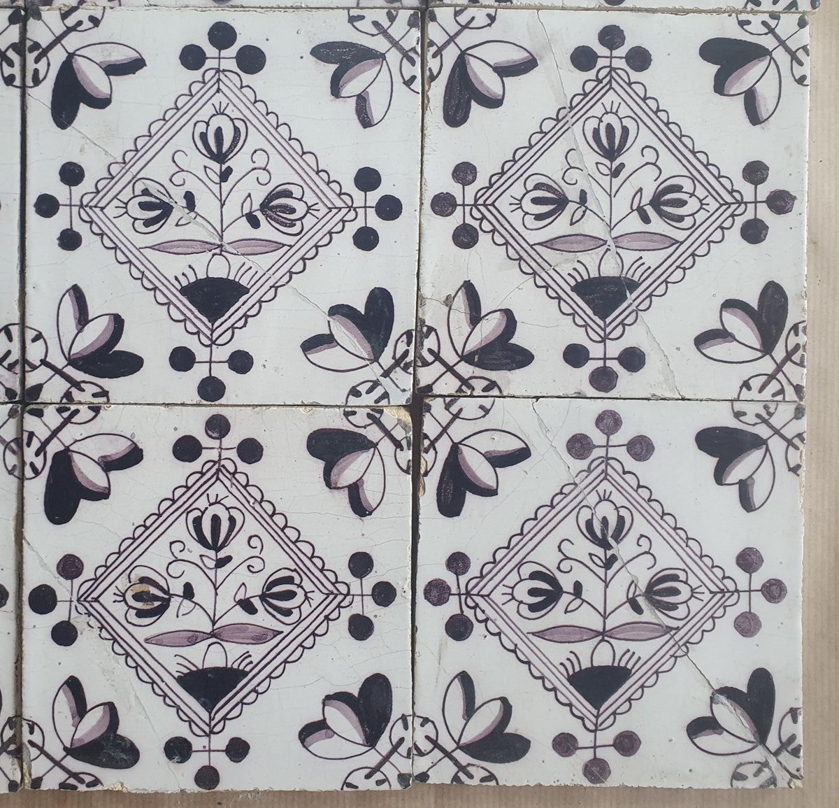 Set of 9 antique Dutch wall tiles, circular tiles featuring flower vases in manganese; Delft Blue Dutch backsplash fireplace tiles.