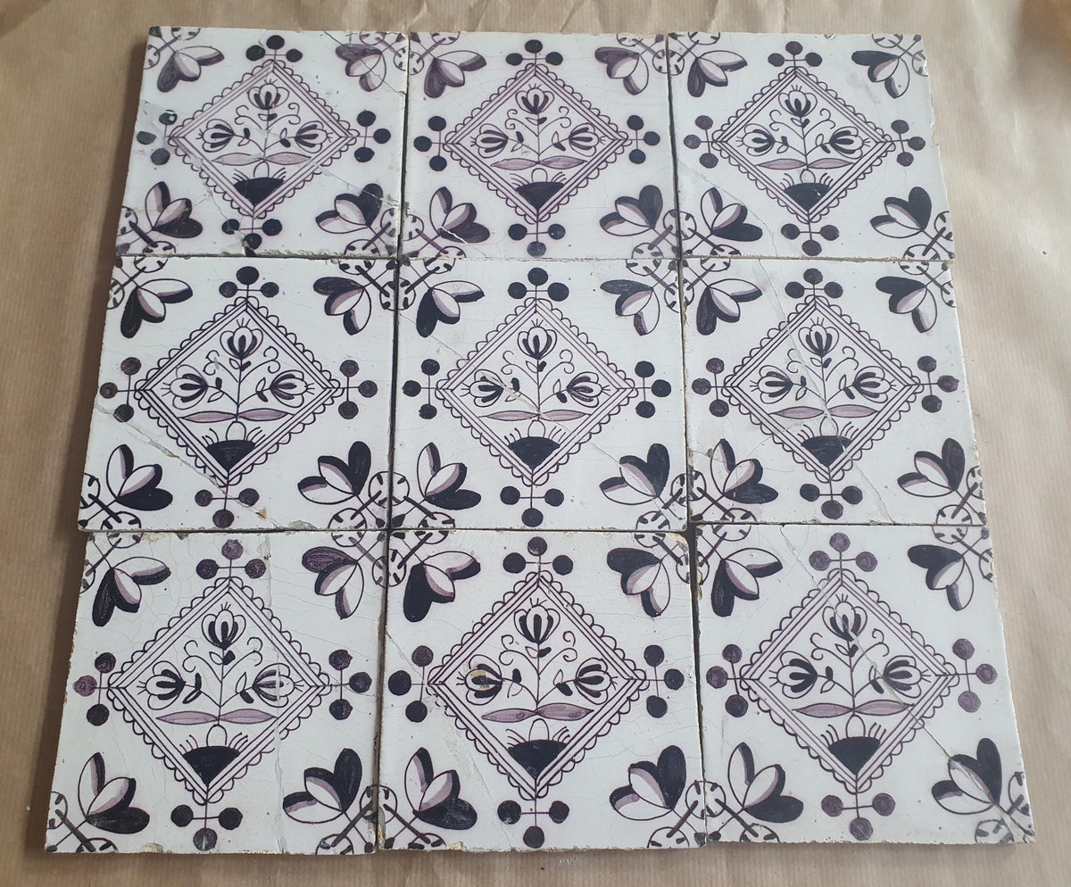 Set of 9 antique Dutch wall tiles, circular tiles featuring flower vases in manganese; Delft Blue Dutch backsplash fireplace tiles.