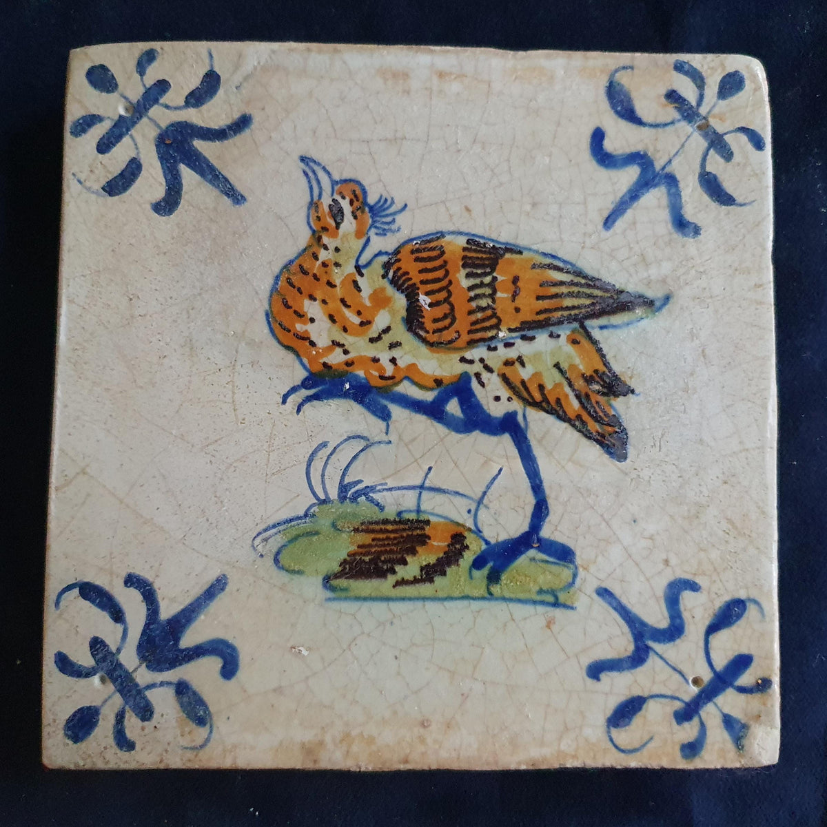 Antique Delft Tile - Polychrome  Bird with lily corner Motifs, Around 1640