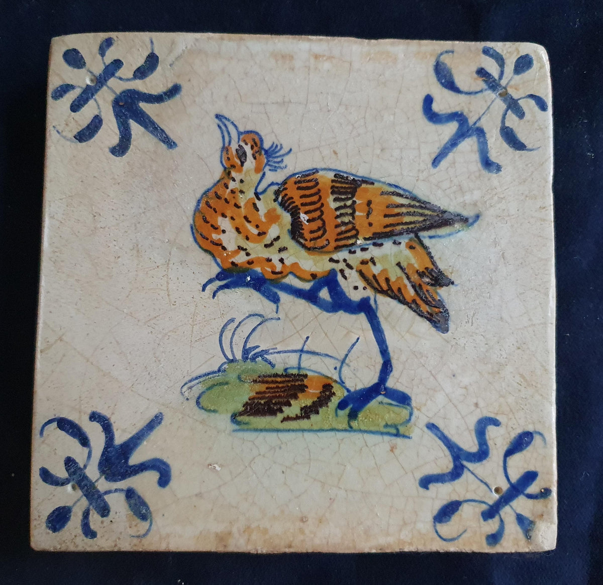 Antique Delft Tile - Polychrome  Bird with lily corner Motifs, Around 1640