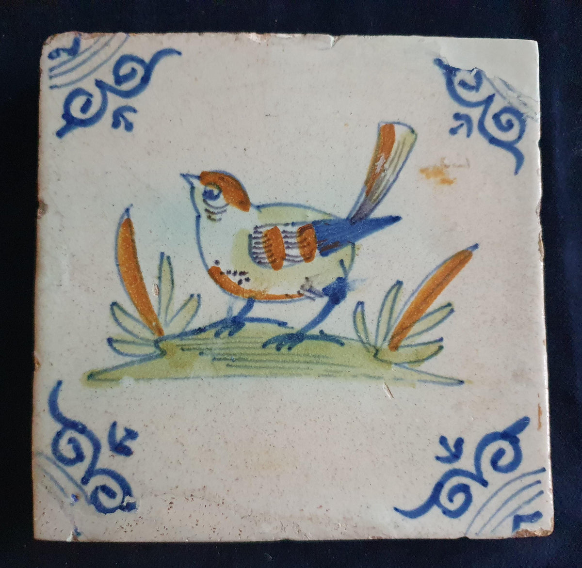 Antique Delft Tile - Polychrome  Bird with oxhead corner Motifs, Around 1640 animaltile