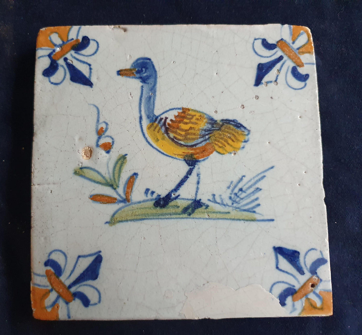 Antique Delft Tile - Polychrome  Bird with lily corner Motifs, Around 1640 animaltile