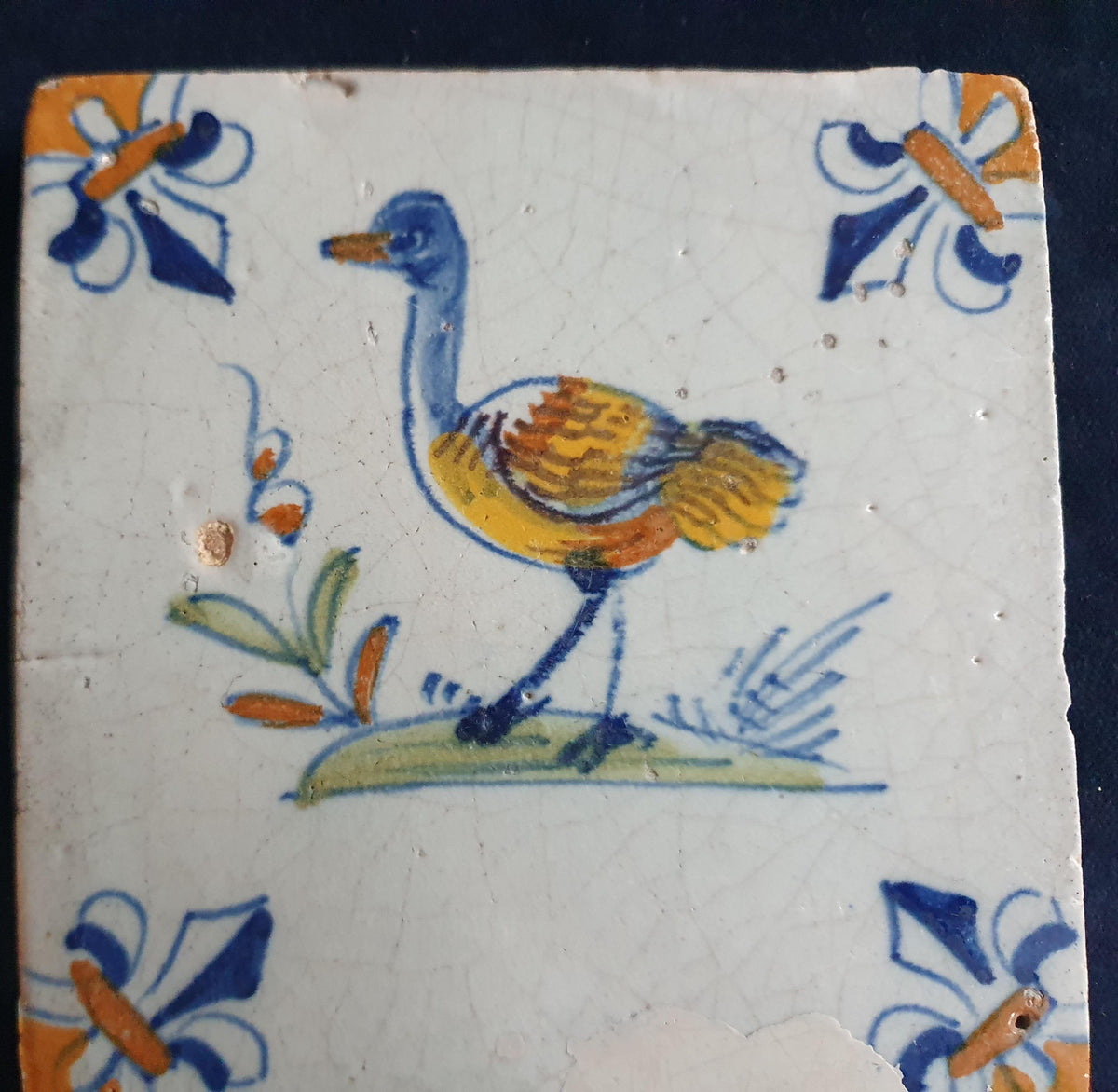 Antique Delft Tile - Polychrome  Bird with lily corner Motifs, Around 1640 animaltile
