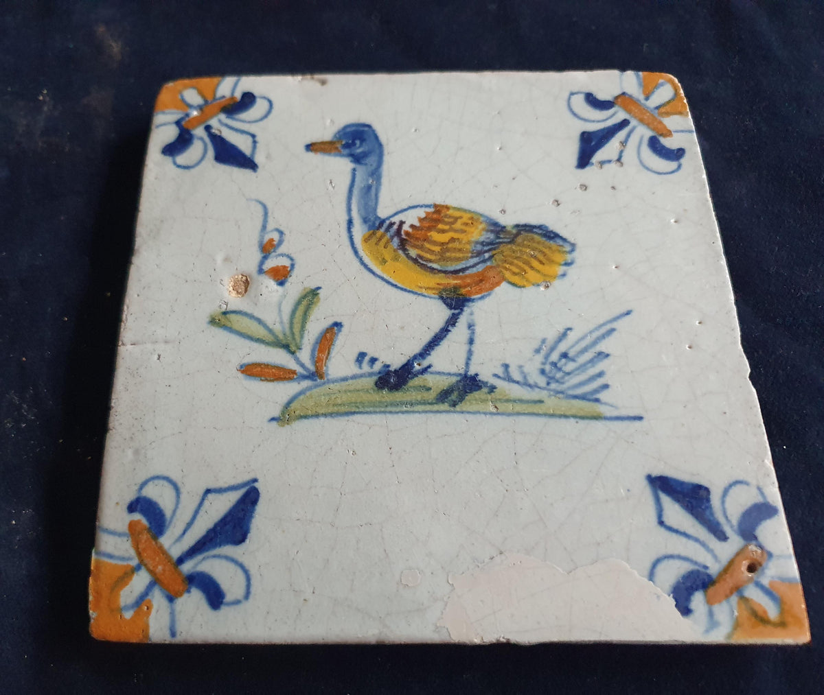 Antique Delft Tile - Polychrome  Bird with lily corner Motifs, Around 1640 animaltile