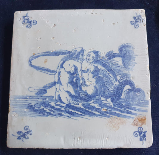 Delft tile with a mermaid and a merman was produced around 1660 . around 1660 mythicaltile