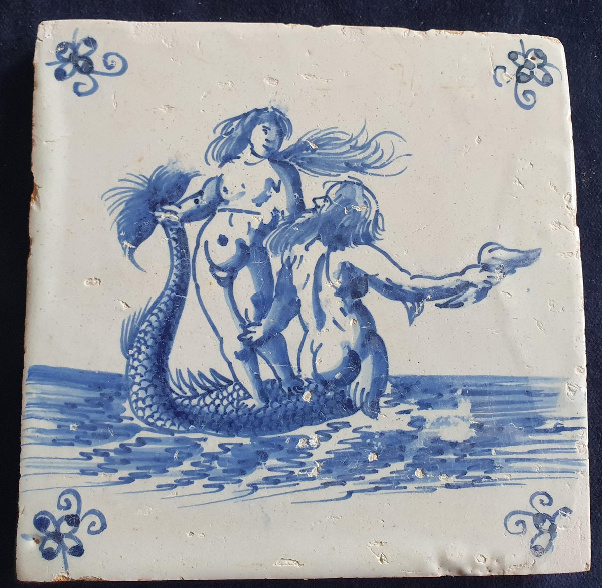 Delft tile with a mermaid and a merman was produced around 1660 . around 1660 mythicaltile