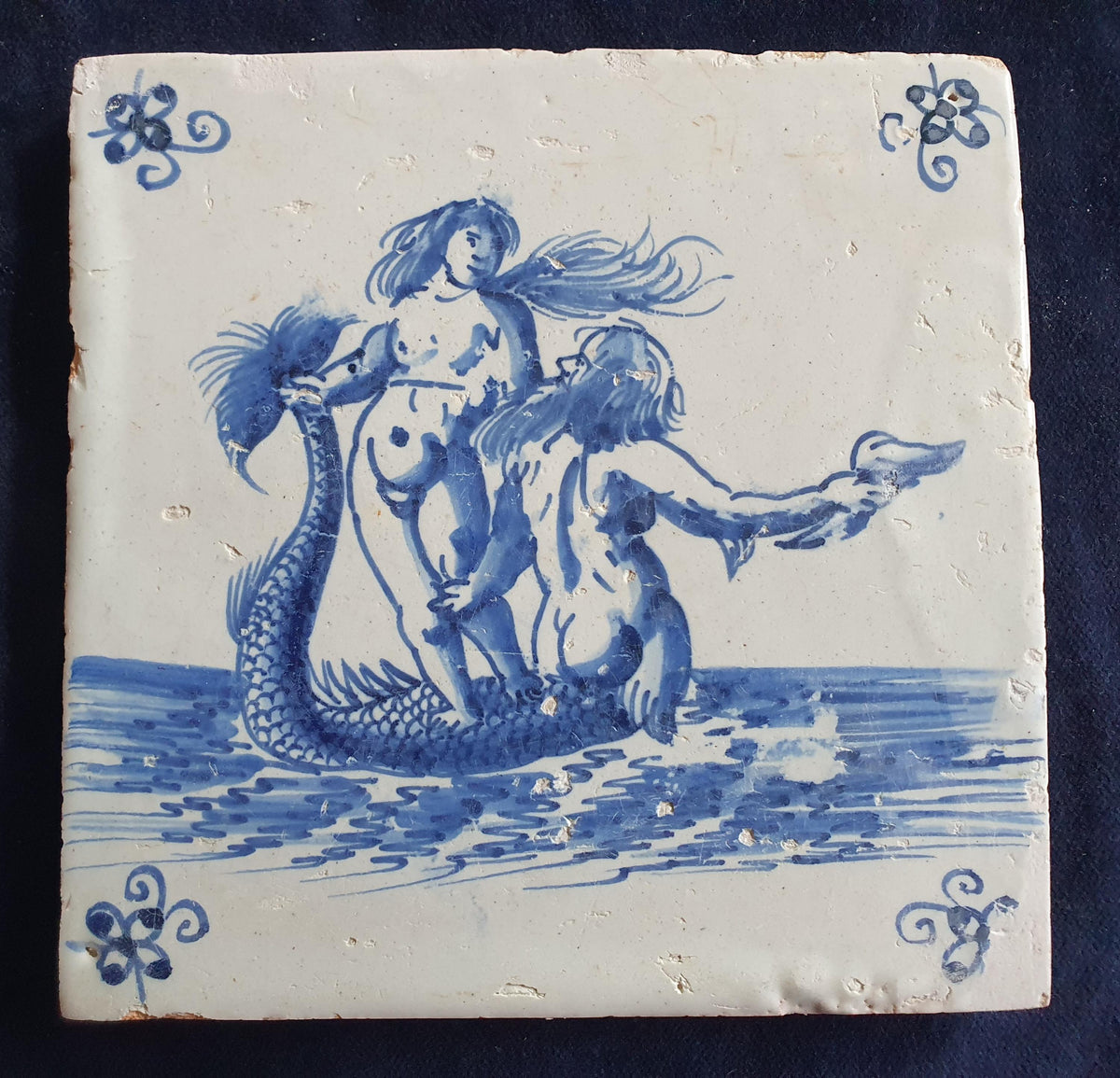 Delft tile with a mermaid and a merman was produced around 1660 . around 1660 mythicaltile