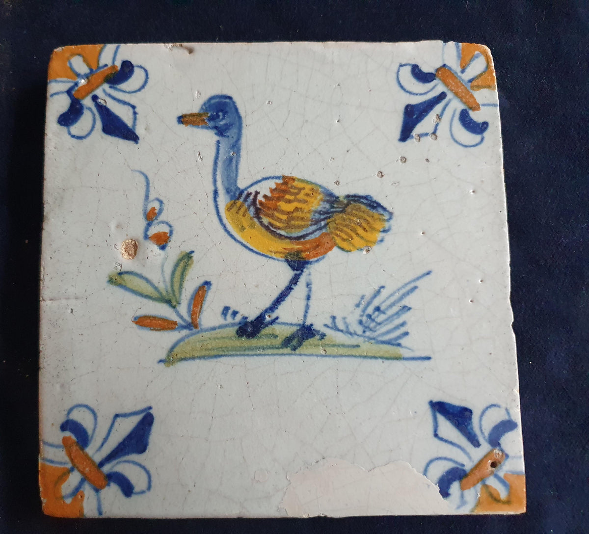 Antique Delft Tile - Polychrome  Bird with lily corner Motifs, Around 1640 animaltile