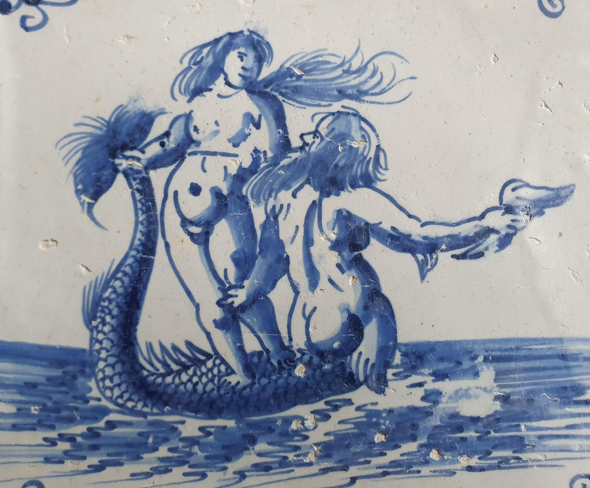 Delft tile with a mermaid and a merman was produced around 1660 . around 1660 mythicaltile