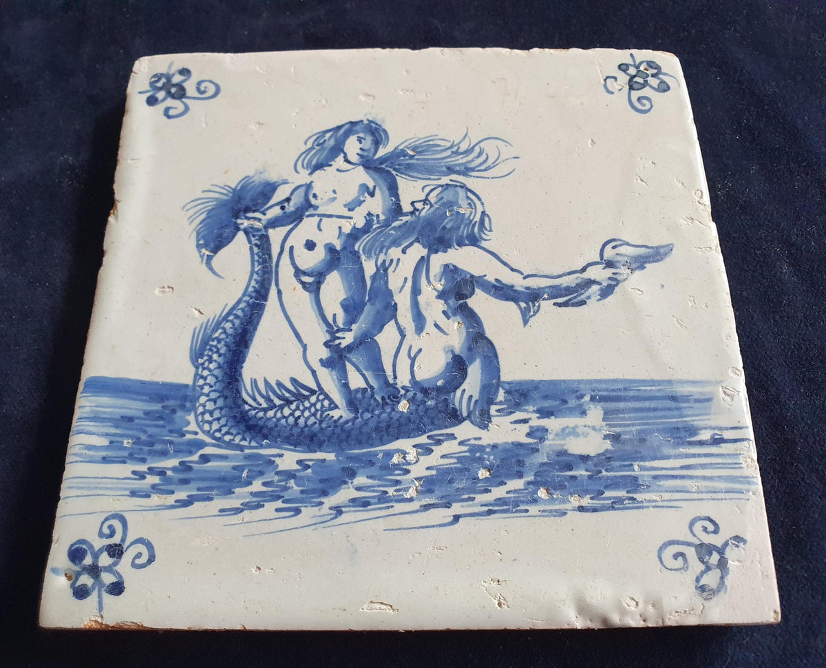 Delft tile with a mermaid and a merman was produced around 1660 . around 1660 mythicaltile