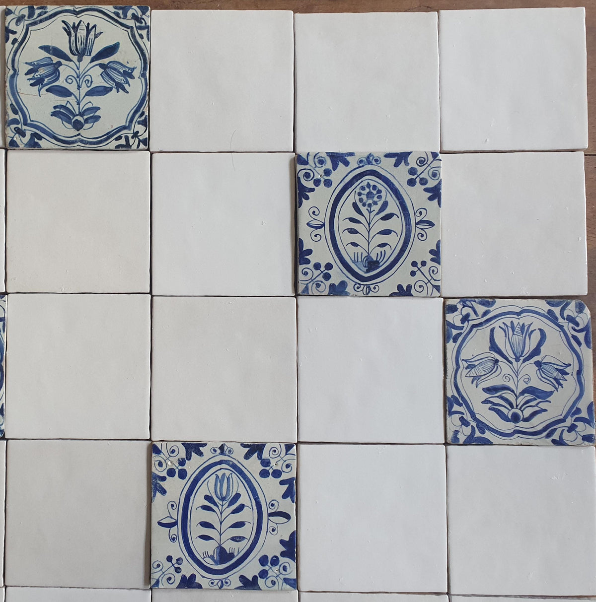 40 tiles, including 8 from the 17th century.  Wall tiles