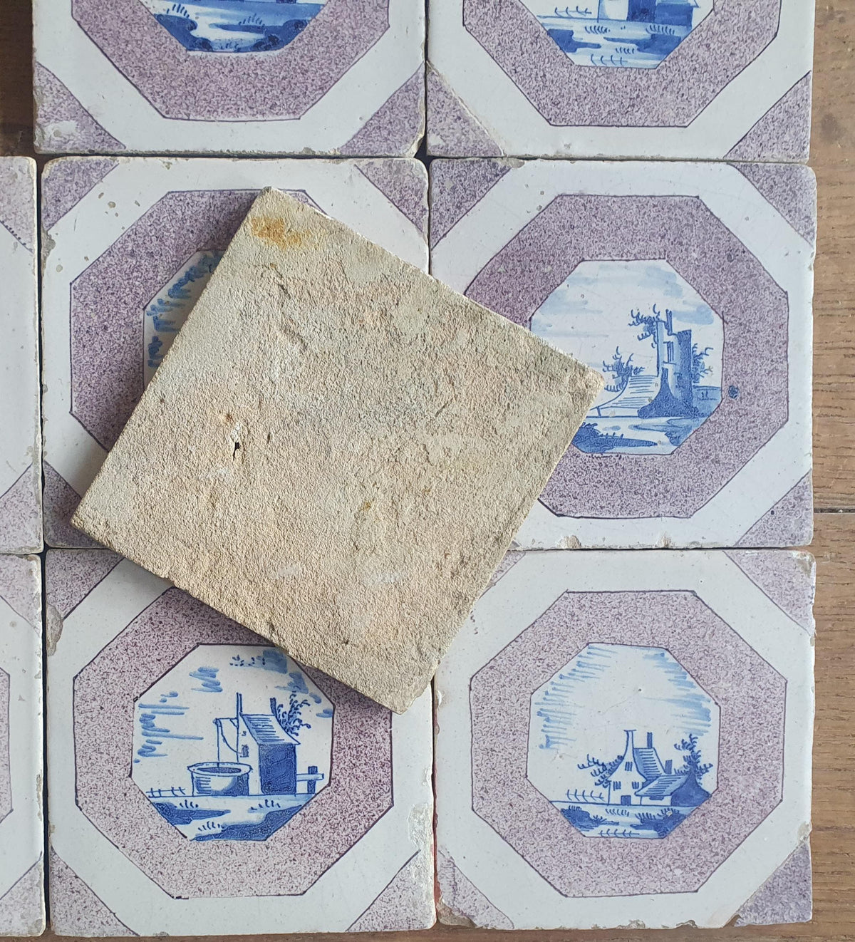 9 x 17th-century Delft tiles (c. 1680) feature landscape scenes painted in blue and manganese Wall tiles