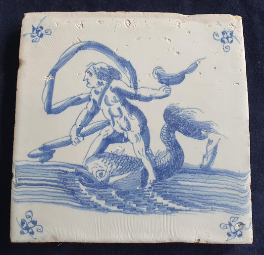 Delft tile with  a merman was produced around 1660 .  mythicaltile