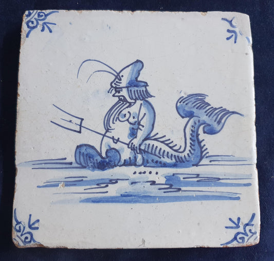Delft tile with  a merman was produced around 1660 .  mythicaltile