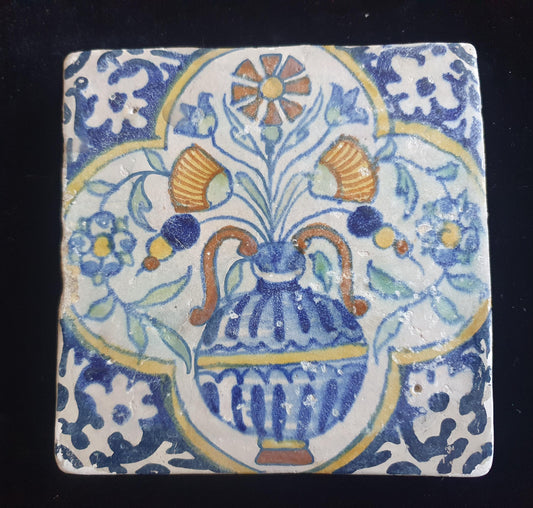 Delft tile, crafted around 1600, depicting a flower vase. Planttile