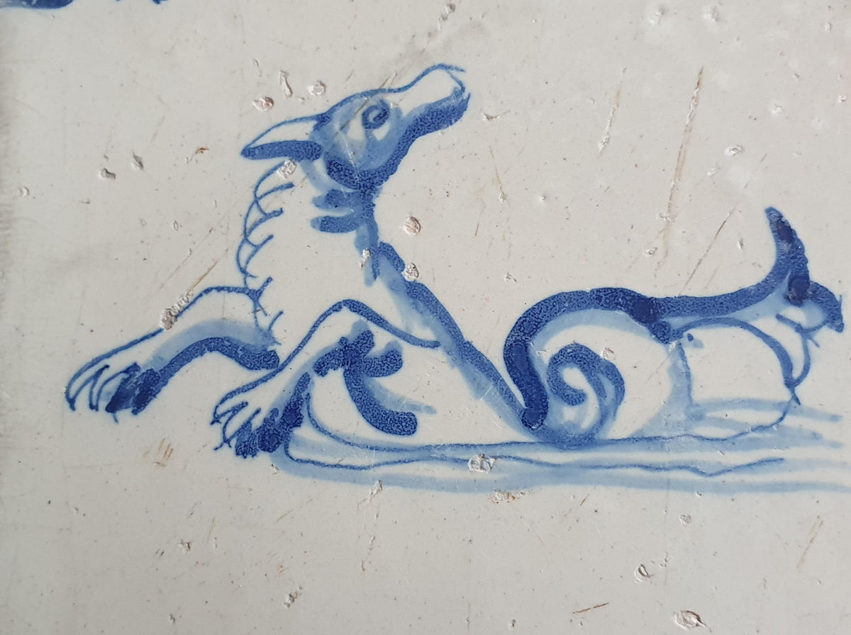 Antique Delft tile depicts a sea monster, around 1640 and made in Amsterdam .  mythicaltile