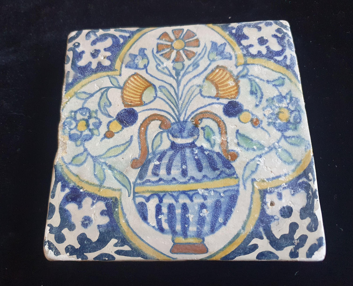 Delft tile, crafted around 1600, depicting a flower vase. Planttile