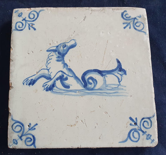 Antique Delft tile depicts a sea monster, around 1640 and made in Amsterdam .  mythicaltile