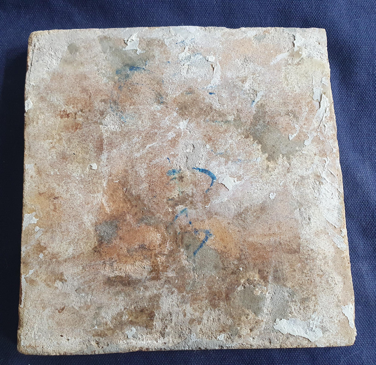 Delft tile, dating from circa 1660, is painted in blue and depicts a ship sailing to the left with its sails fully hoisted. Shiptile